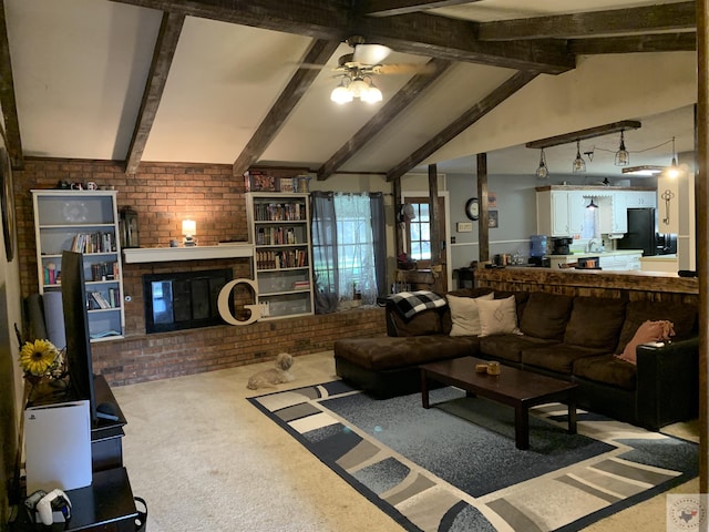 living room featuring carpet flooring, a fireplace, brick wall, ceiling fan, and lofted ceiling with beams