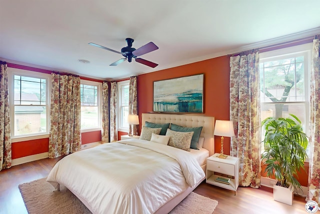 2300 Laurel St, Texarkana, AR 71854 - bedroom with wood finished floors and a ceiling fan