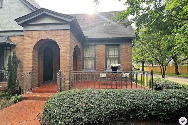 2300 Laurel St, Texarkana, AR 71854 - entrance to property featuring brick siding and roof with shingles