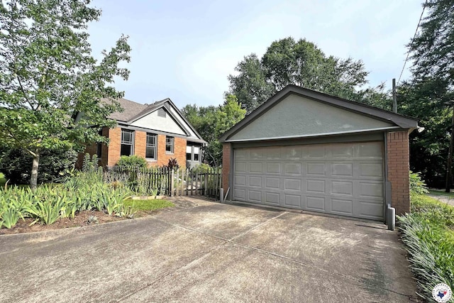 2300 Laurel St, Texarkana, AR 71854 - ranch-style house featuring brick siding, a garage, and an outdoor structure