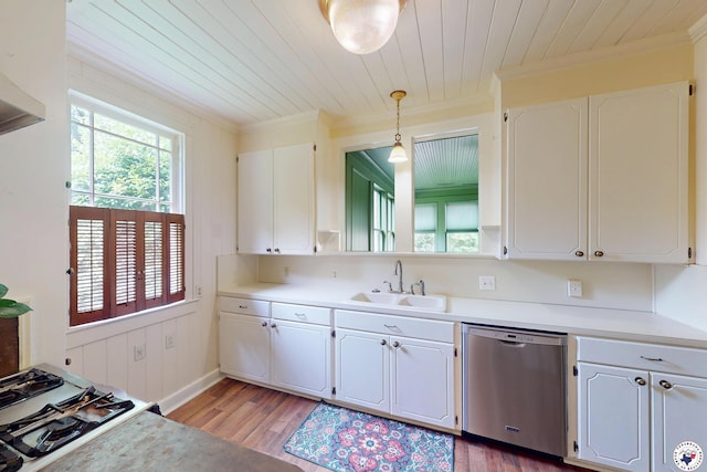 2300 Laurel St, Texarkana, AR 71854 - kitchen with dishwasher, crown molding, white cabinets, light wood finished floors, and light countertops