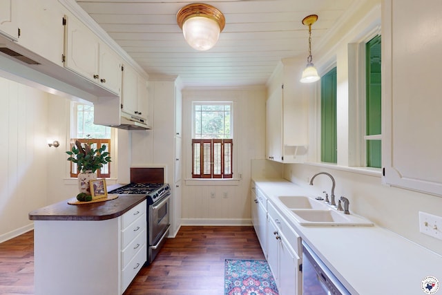 2300 Laurel St, Texarkana, AR 71854 - kitchen featuring stainless steel appliances, dark wood finished floors, healthy amount of natural light, white cabinetry, and wood ceiling
