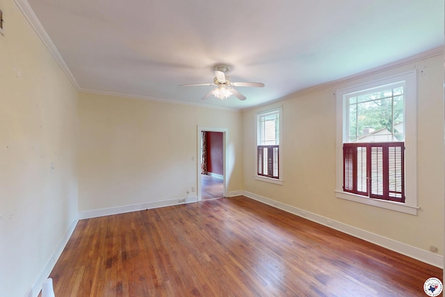 2300 Laurel St, Texarkana, AR 71854 - unfurnished room with ceiling fan, hardwood / wood-style flooring, and crown molding