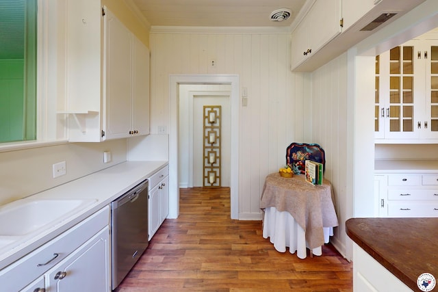 2300 Laurel St, Texarkana, AR 71854 - kitchen featuring dishwasher, wood finished floors, and white cabinetry
