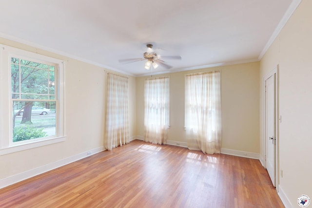 2300 Laurel St, Texarkana, AR 71854 - spare room featuring a ceiling fan, light wood-style flooring, and crown molding