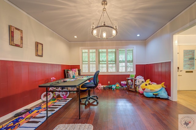 home office featuring a chandelier, wood walls, ornamental molding, and dark hardwood / wood-style flooring