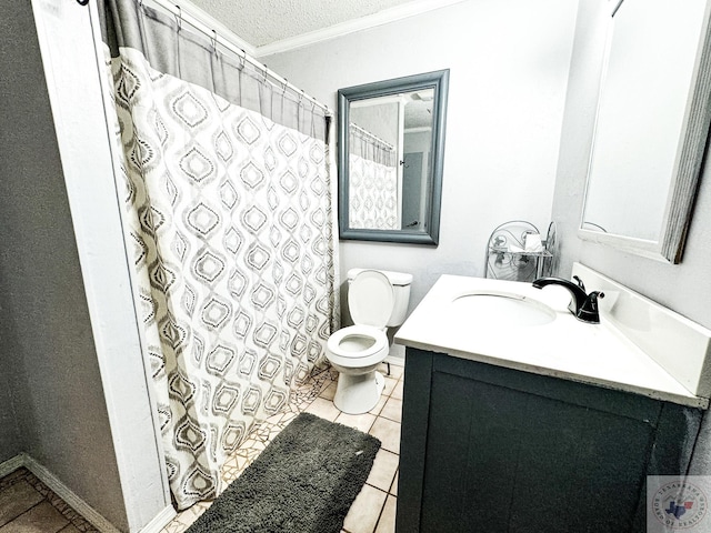 bathroom with toilet, a textured ceiling, tile patterned floors, ornamental molding, and vanity