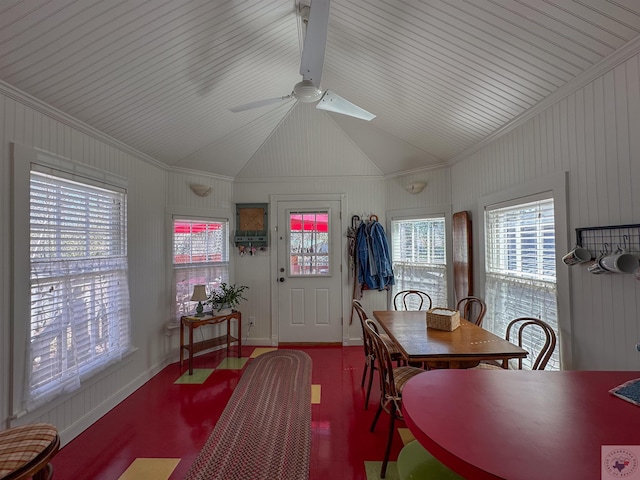 dining room with lofted ceiling, a ceiling fan, and baseboards