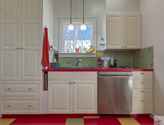 kitchen featuring backsplash, dishwasher, white cabinetry, and a sink