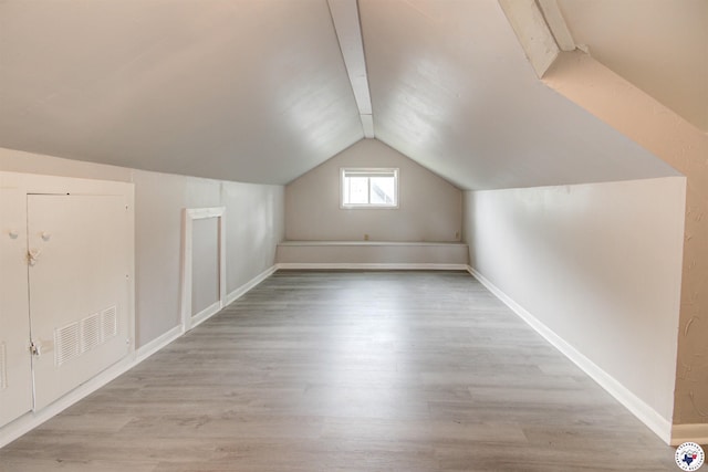 1920 Laurel St, Texarkana, AR 71854 - additional living space featuring light wood-style flooring, lofted ceiling, and baseboards