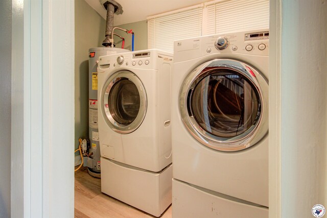 1920 Laurel St, Texarkana, AR 71854 - washroom with separate washer and dryer and light wood-type flooring