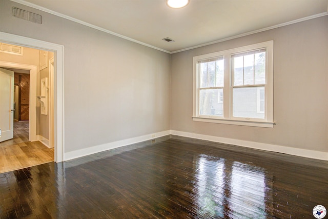 1920 Laurel St, Texarkana, AR 71854 - unfurnished room featuring baseboards, hardwood / wood-style flooring, and ornamental molding
