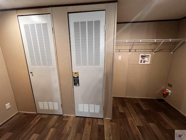2 Rayn St, Texarkana, TX 75501 - laundry room with washer hookup, laundry area, a heating unit, and dark wood-style flooring