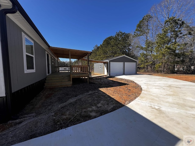 2 Rayn St, Texarkana, TX 75501 - view of property exterior with an outbuilding and a garage