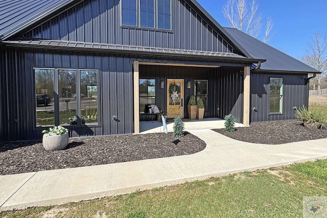 view of front of home featuring metal roof and board and batten siding