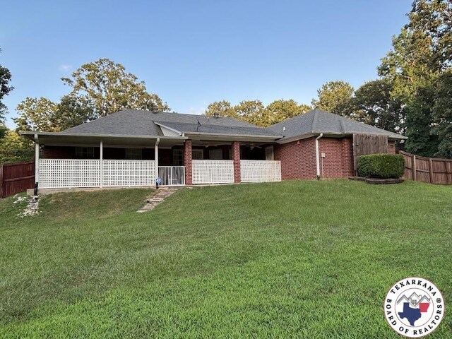 147 Mc 458, Texarkana, AR 71854 - view of front of property featuring a shingled roof and brick siding