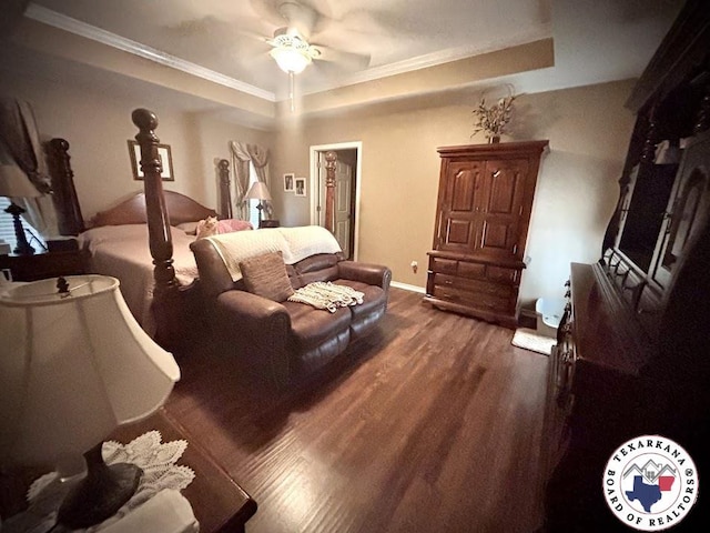 147 Mc 458, Texarkana, AR 71854 - bedroom featuring wood finished floors, crown molding, a raised ceiling, and a ceiling fan