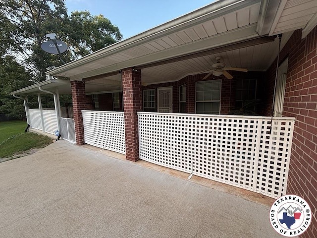 147 Mc 458, Texarkana, AR 71854 - view of property exterior featuring brick siding and ceiling fan