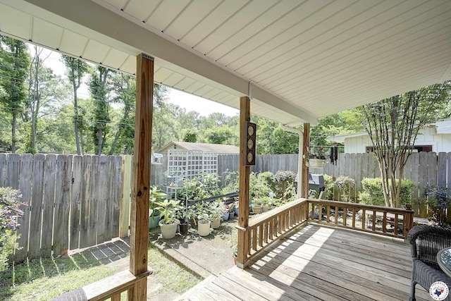 3916 Sabine Ave, Texarkana, TX 75503 - wooden deck with a fenced backyard