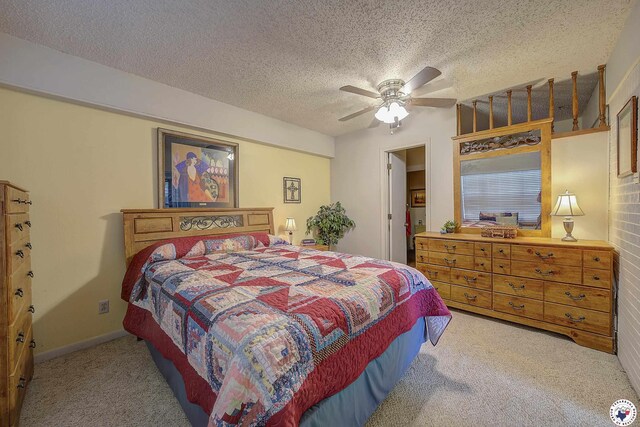 3916 Sabine Ave, Texarkana, TX 75503 - bedroom with light carpet, a textured ceiling, and ceiling fan