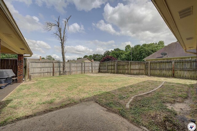 4 Heatherwood Dr, Texarkana, TX 75503 - view of yard with a fenced backyard and visible vents
