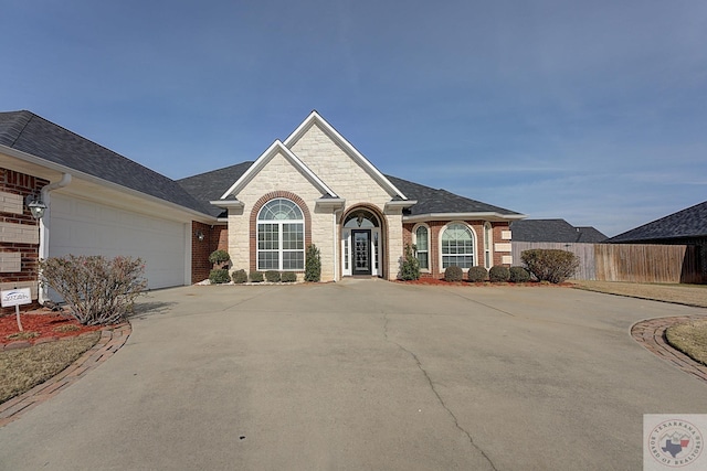 view of front of property featuring a garage