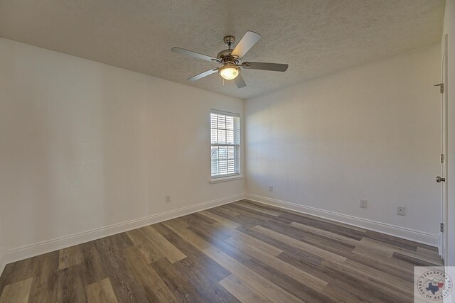 unfurnished room featuring ceiling fan, a textured ceiling, and dark hardwood / wood-style flooring