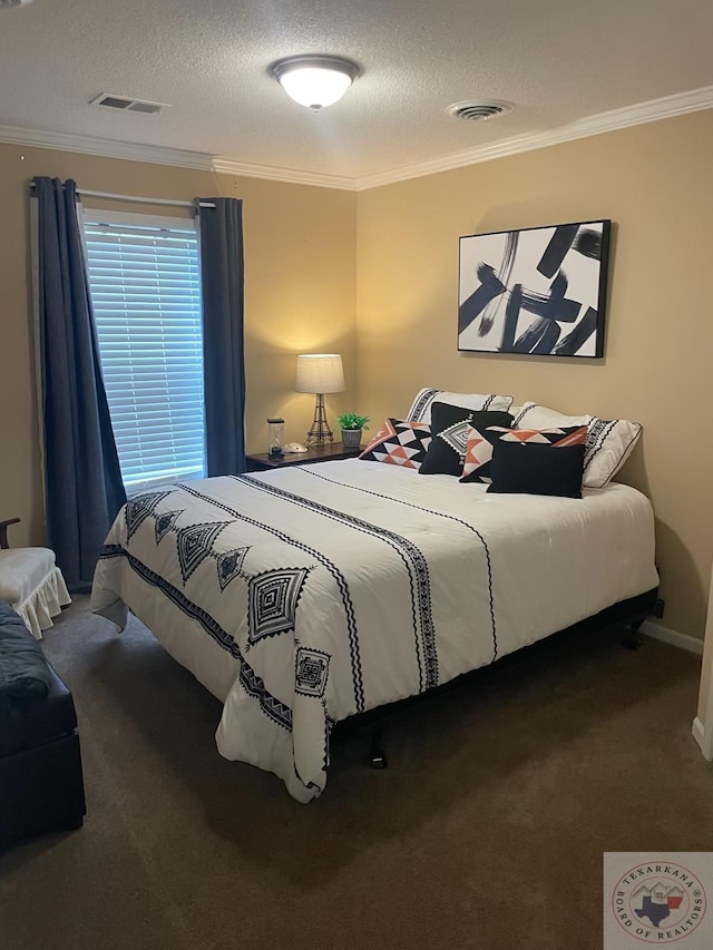 carpeted bedroom with crown molding and a textured ceiling