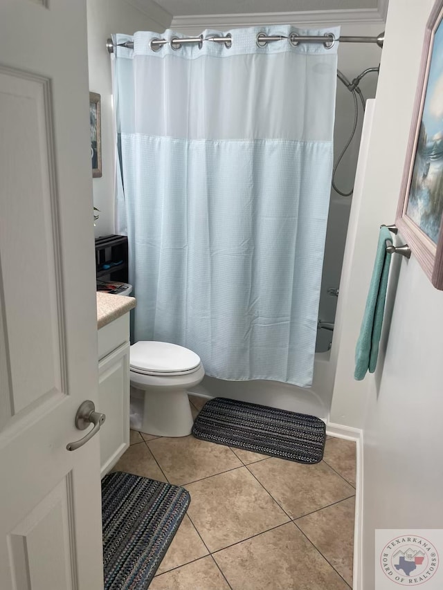 full bathroom featuring vanity, toilet, tile patterned floors, and shower / tub combo