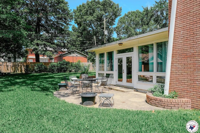 3519 Olive St, Texarkana, TX 75503 - view of yard featuring a patio area and french doors