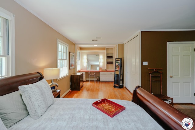 3519 Olive St, Texarkana, TX 75503 - bedroom with wood finished floors, a closet, and baseboards