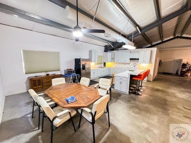 interior space featuring stainless steel fridge and ceiling fan