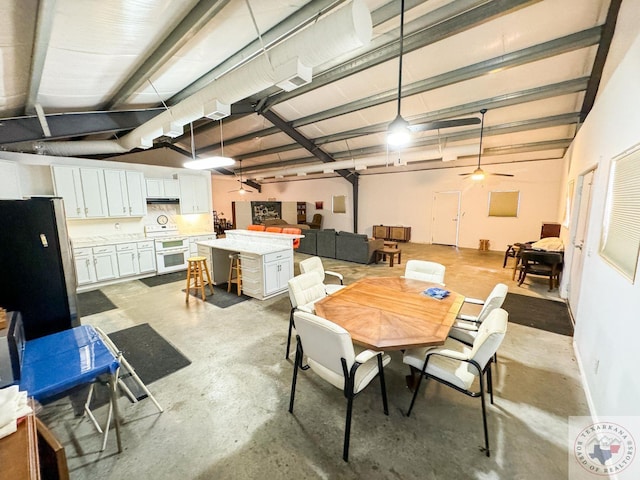 dining space featuring ceiling fan