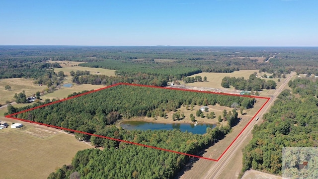 aerial view featuring a rural view and a water view