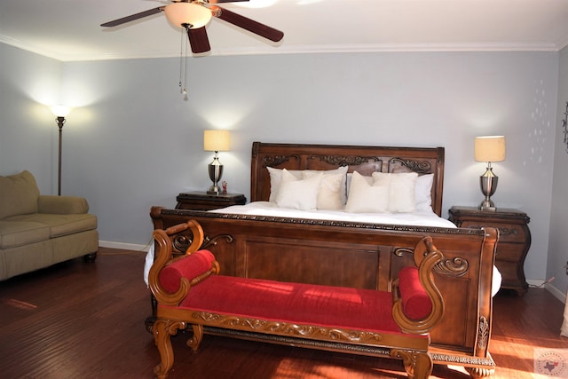 bedroom featuring ceiling fan, ornamental molding, and dark hardwood / wood-style flooring