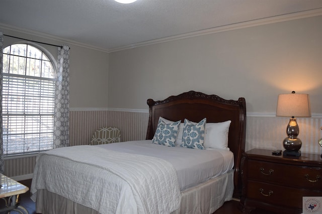 bedroom with ornamental molding