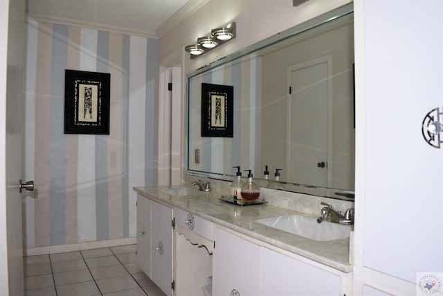 bathroom with vanity, ornamental molding, and tile patterned flooring