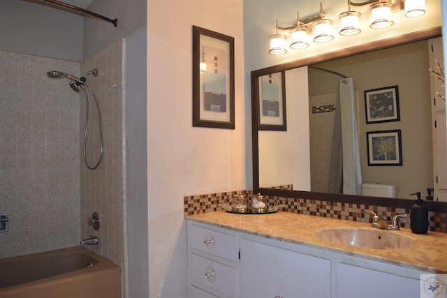 full bathroom featuring backsplash, toilet, vanity, and shower / bath combination with curtain