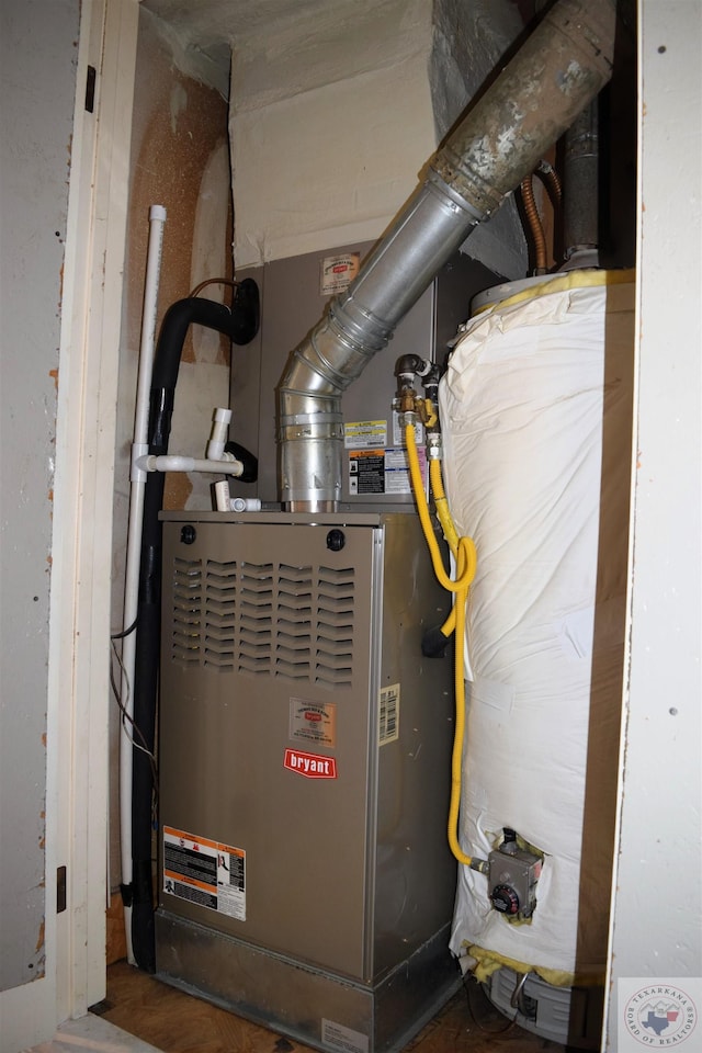 utility room with heating unit