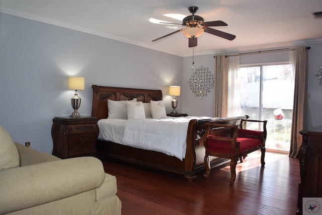 bedroom with dark hardwood / wood-style floors, ceiling fan, and ornamental molding