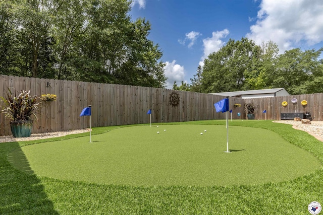 113 Dove Crk, New Boston, TX 75570 - view of home's community with an area to practice putting and a fenced backyard