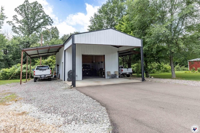 113 Dove Crk, New Boston, TX 75570 - view of car parking with a garage