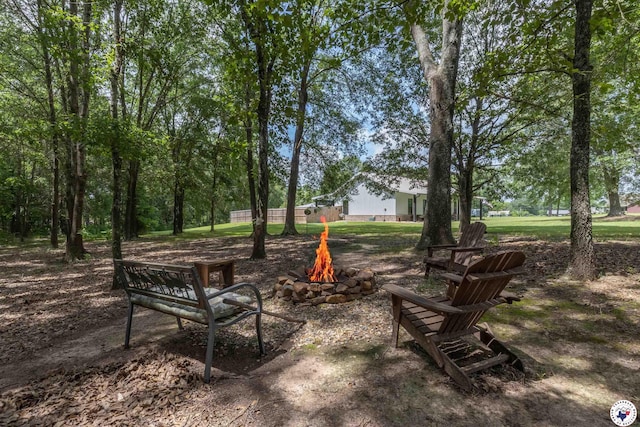 113 Dove Crk, New Boston, TX 75570 - view of yard featuring a fire pit