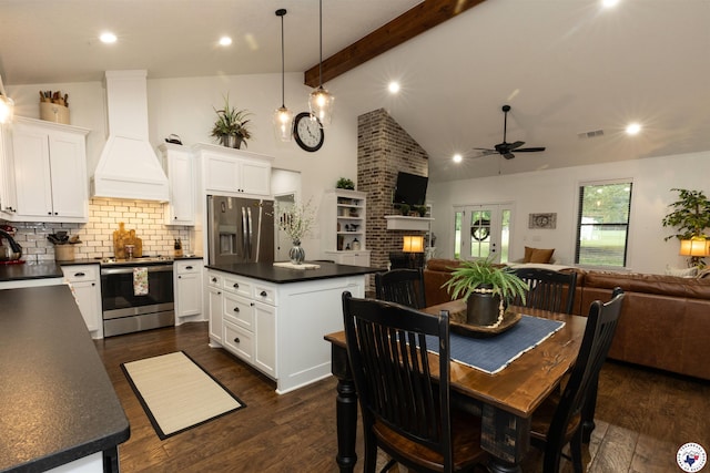 113 Dove Crk, New Boston, TX 75570 - dining space with a ceiling fan, beamed ceiling, dark wood-style floors, a fireplace, and recessed lighting