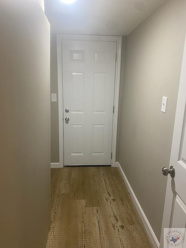 doorway to outside featuring light hardwood / wood-style floors