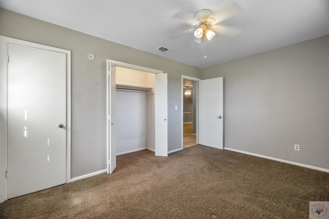 unfurnished bedroom featuring a closet, ceiling fan, and carpet flooring