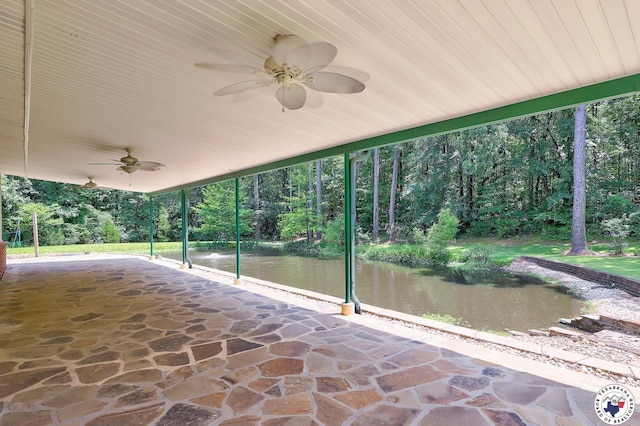 142 Easy St, Texarkana, TX 75503 - view of patio / terrace featuring ceiling fan, view of wooded area, and a water view