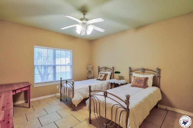 142 Easy St, Texarkana, TX 75503 - tiled bedroom with baseboards and ceiling fan