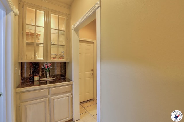 142 Easy St, Texarkana, TX 75503 - bar area featuring light tile patterned flooring and decorative backsplash