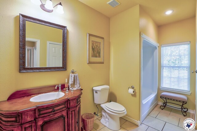 142 Easy St, Texarkana, TX 75503 - full bathroom with toilet, tile patterned flooring, vanity, a bathtub, and baseboards